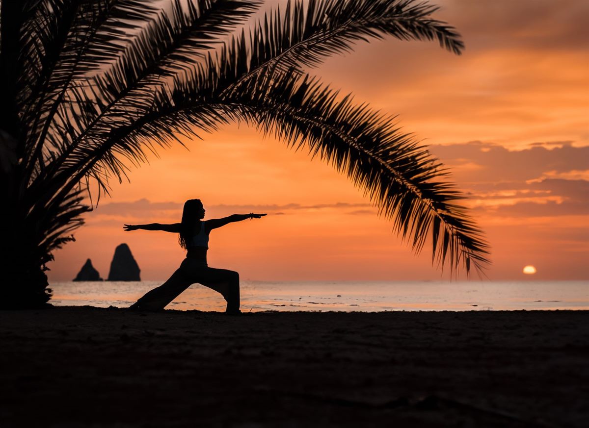 Yoga on the beach at sunrise in Taghazout — surf and yoga guide