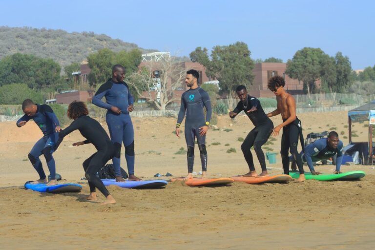 Surf instructor giving a beach briefing near Agadir in Taghazout